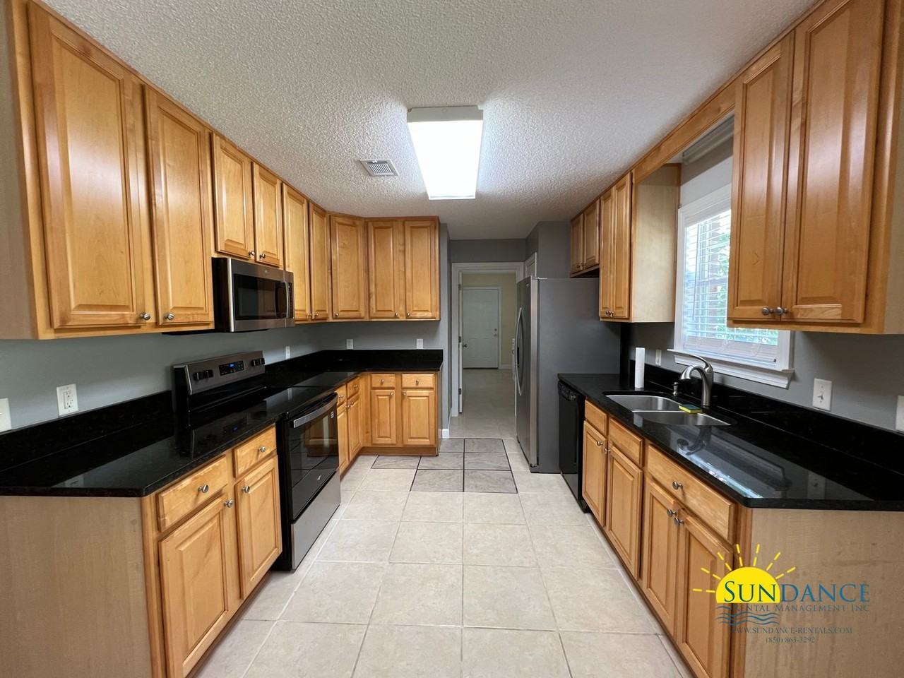 5833 Jack Stokes Rd - Photo 4 of 27