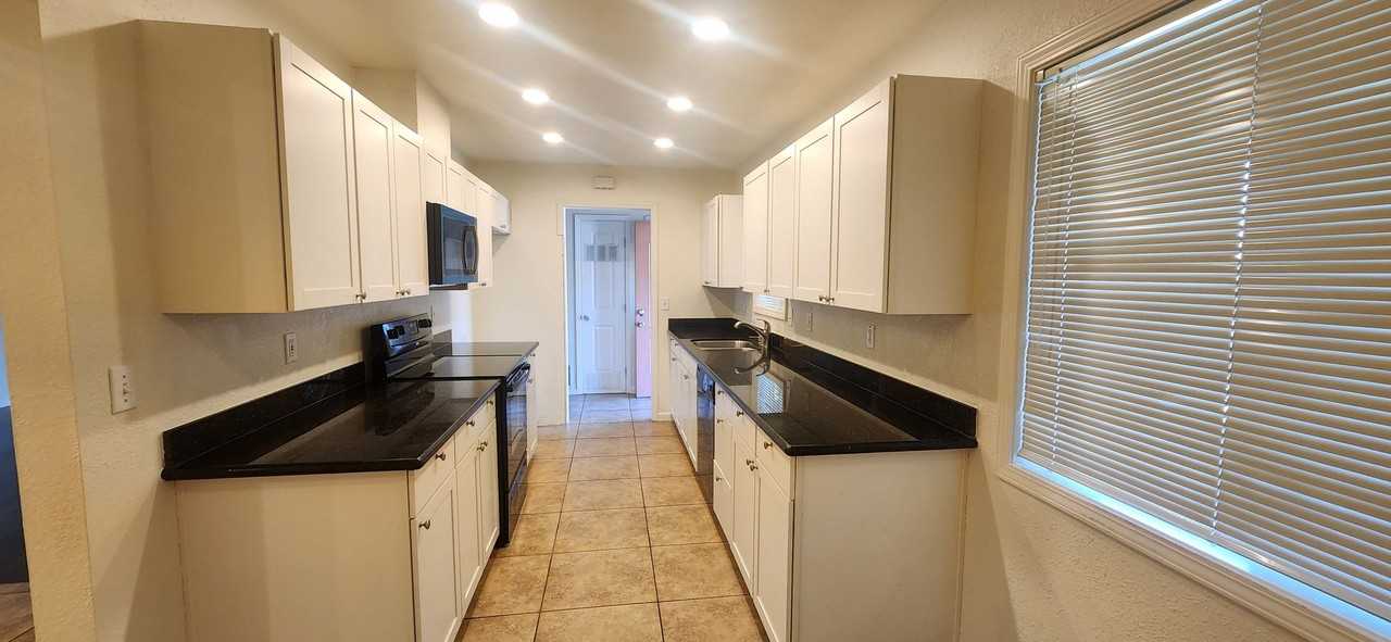 6955 6955 South Land Park/1301 58th Avenue - Photo 3 of 12