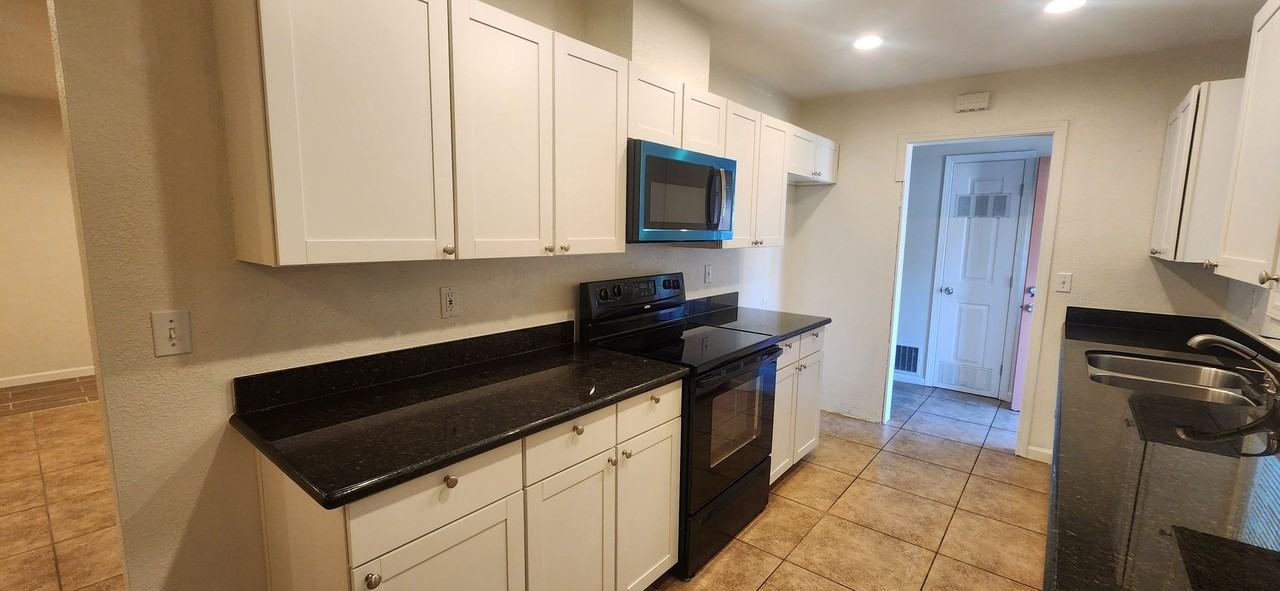 6955 6955 South Land Park/1301 58th Avenue - Photo 5 of 12