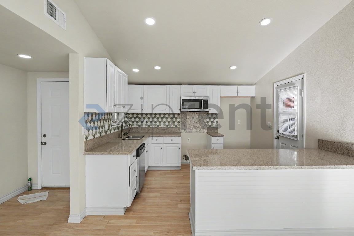 44283 Raysack Ave - Photo 6 of 16