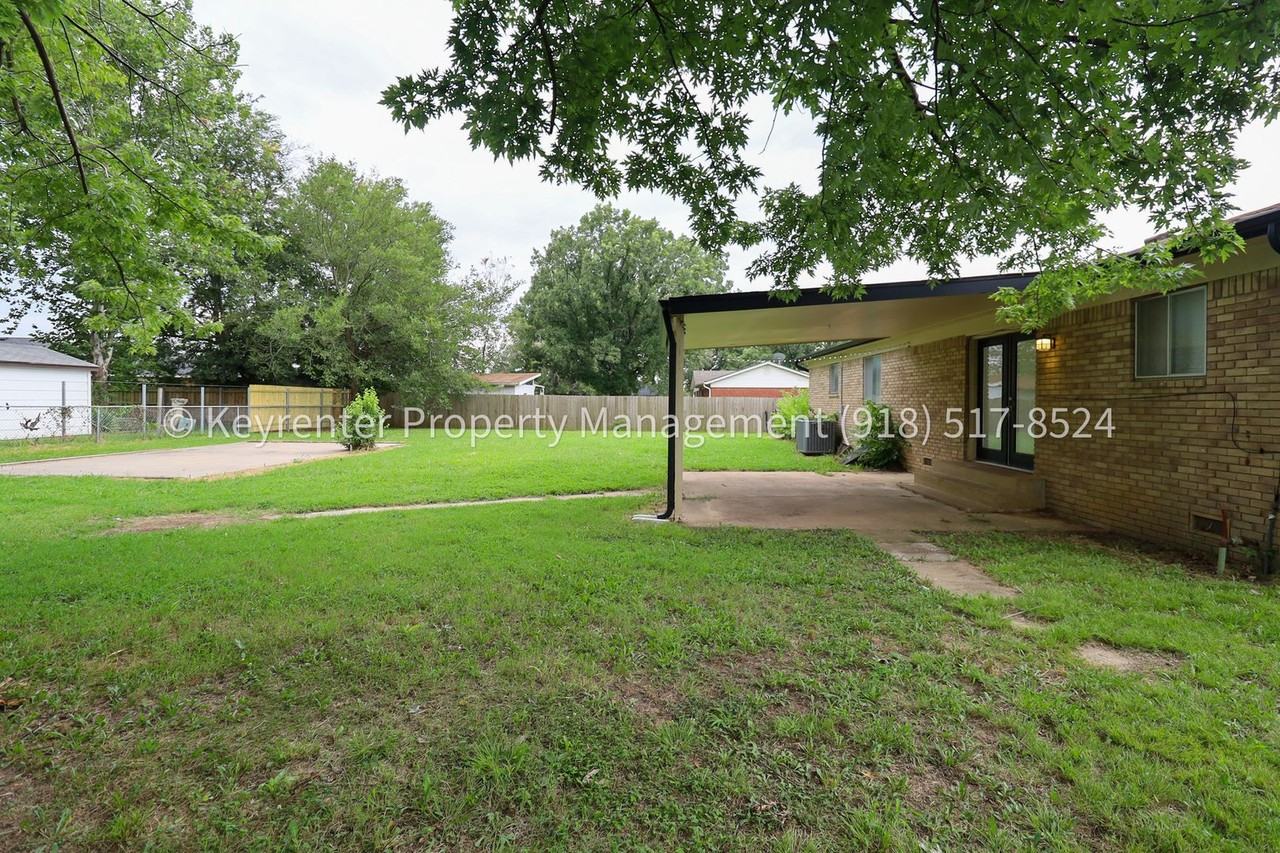 11621 N 103rd East Ave - Photo 6 of 39