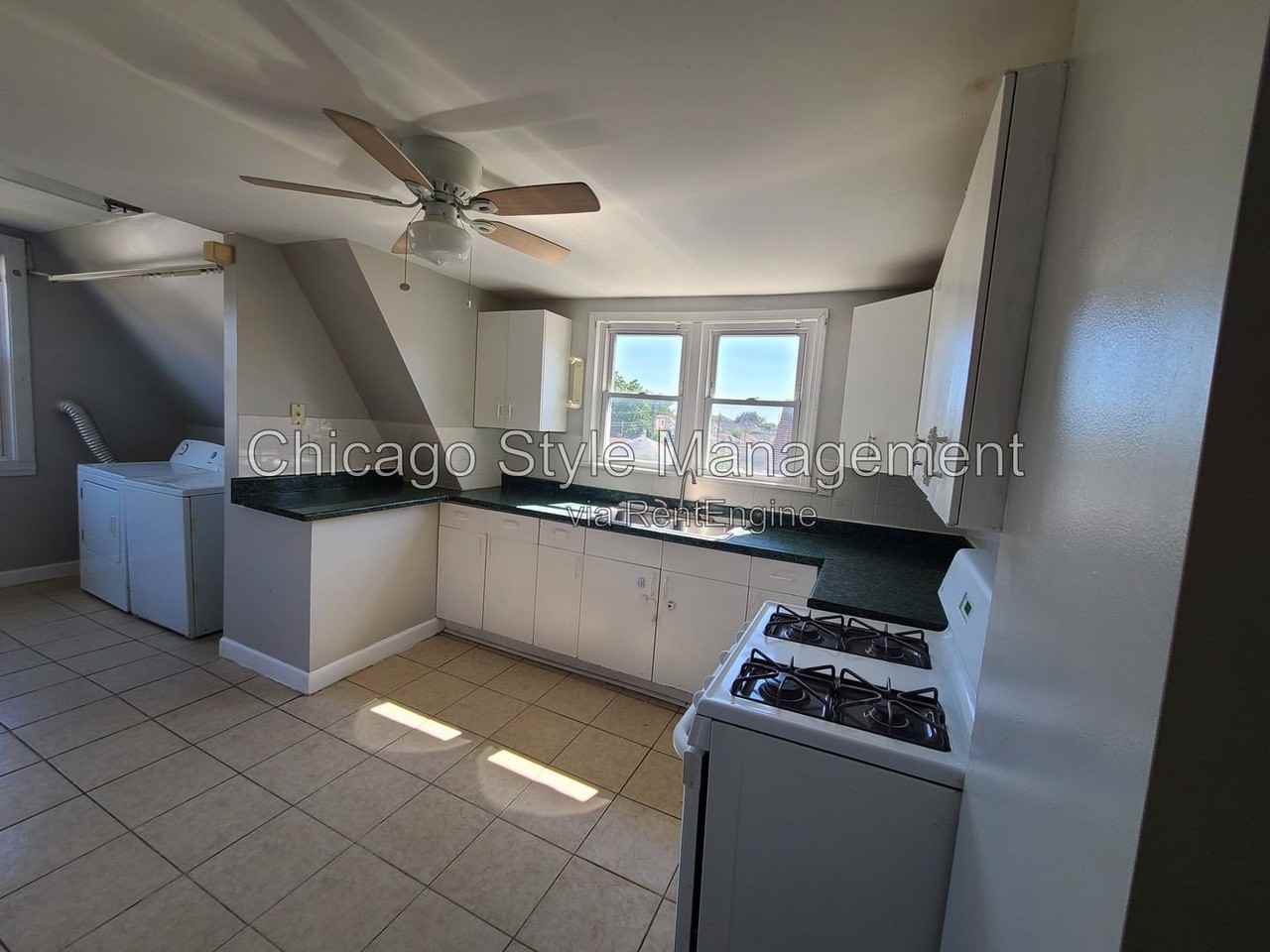 6035 S Karlov Ave #2ndFL - Photo 3 of 19