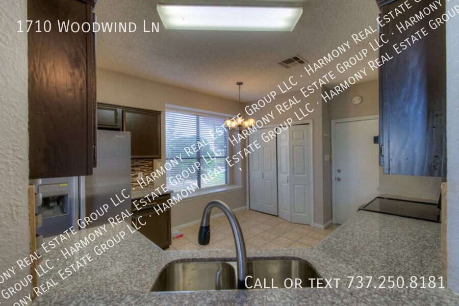1710 Woodwind Ln - Photo 7 of 15