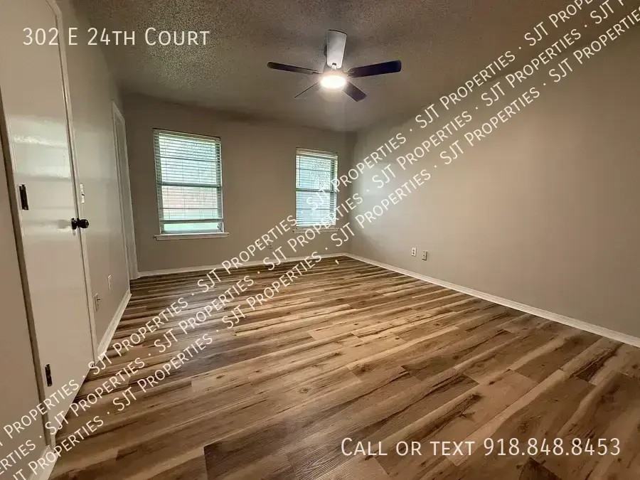 302 E 24th Ct - Photo 7 of 11