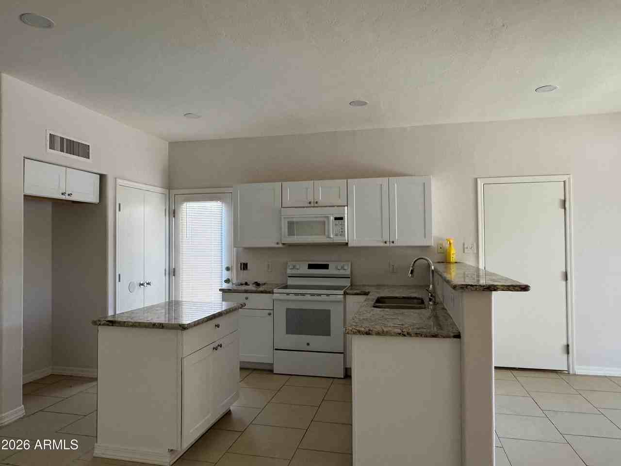 1309 S 121st Ln - Photo 2 of 12
