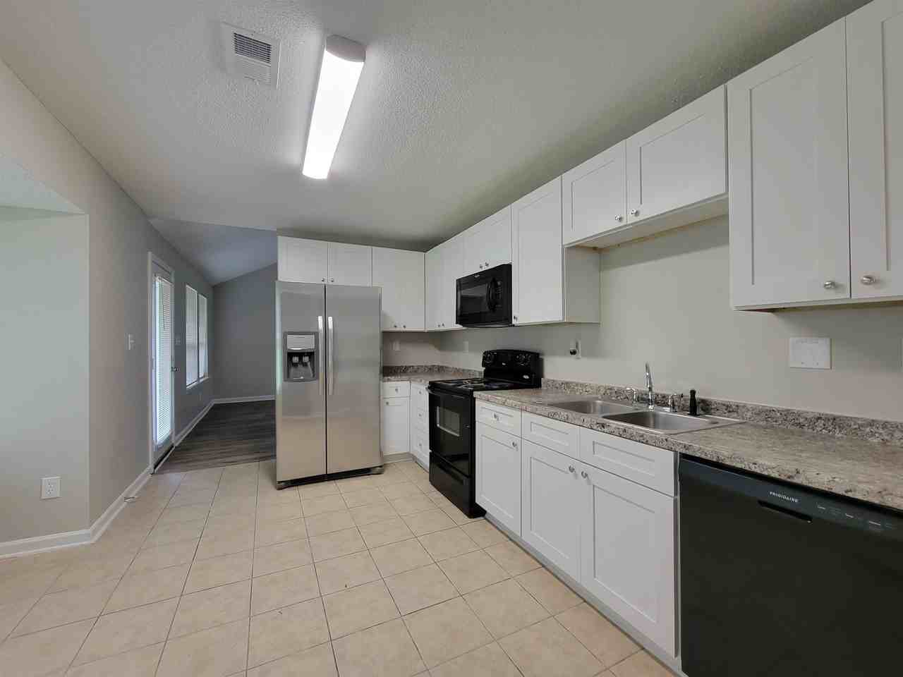 7025 Stoneridge Dr - Photo 7 of 14