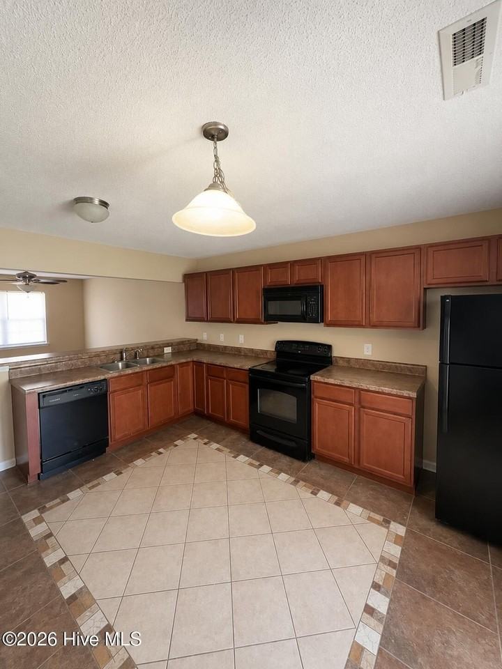 7001 Grandeur Ave - Photo 5 of 18
