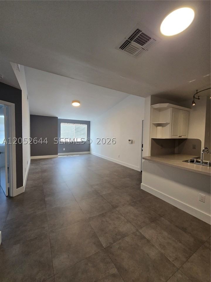 18324 Nw 68th Ave #L - Photo 2 of 11