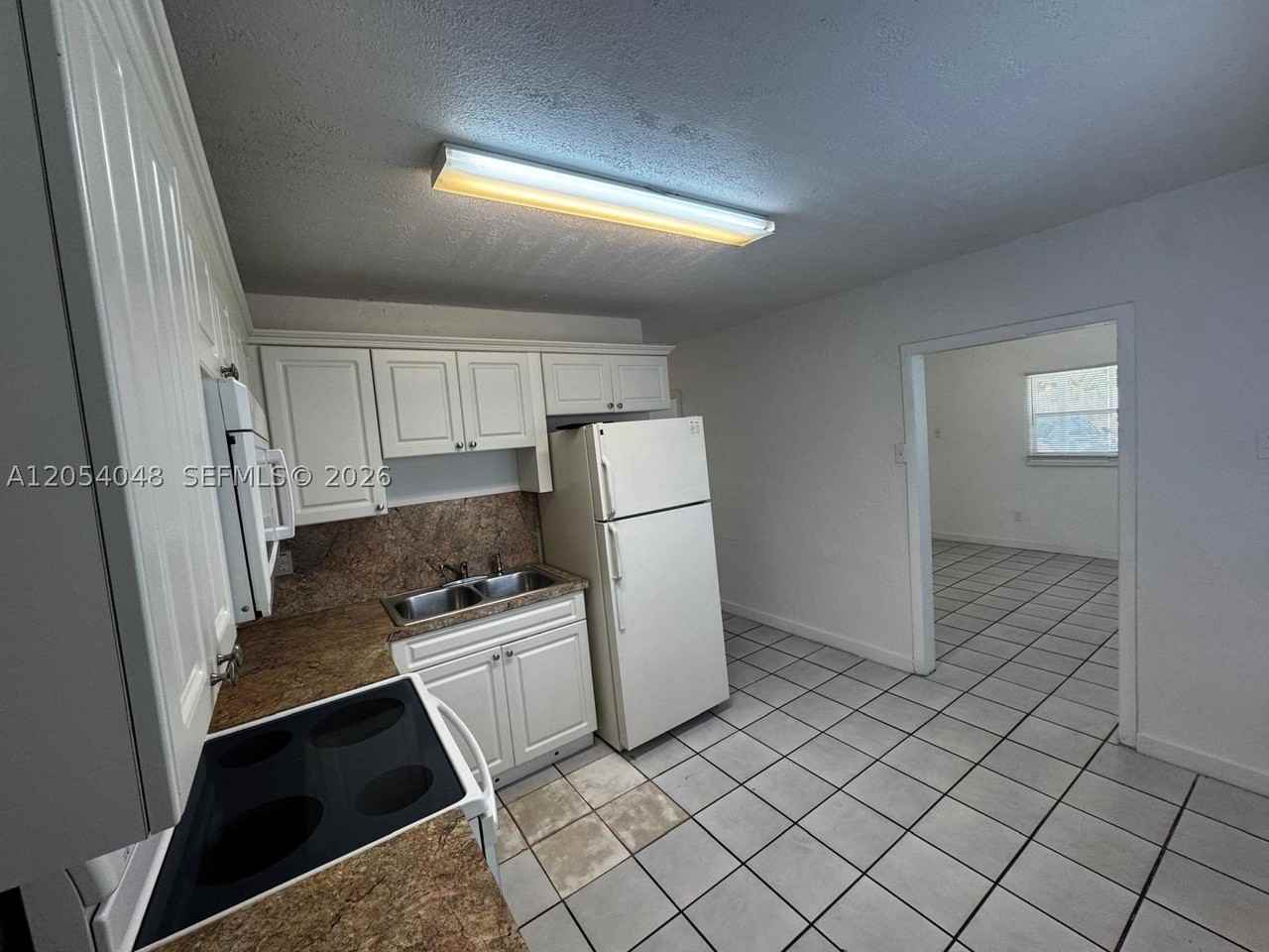 1354 Sw 26th Ave - Photo 4 of 16