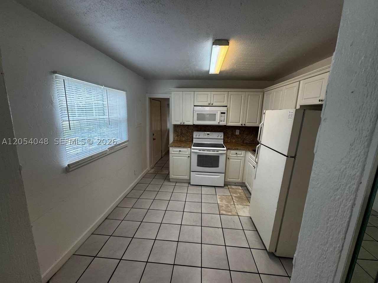 1354 Sw 26th Ave - Photo 5 of 16