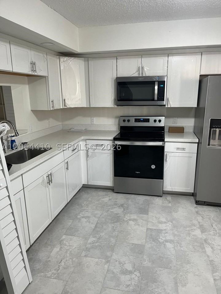 1351 Sw 141st Ave #207G - Photo 2 of 16