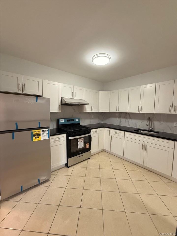 1977 73rd St #2FL - Photo 3 of 10