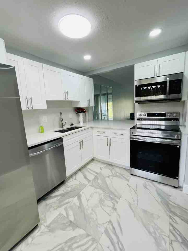 5980 Nw 64th Ave #203 - Photo 2 of 13