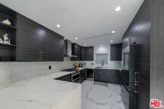 7719 Rhodes Ave - Photo 3 of 8