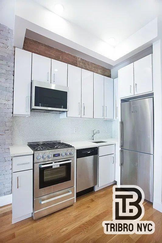103 W 136th St - Photo 4 of 5