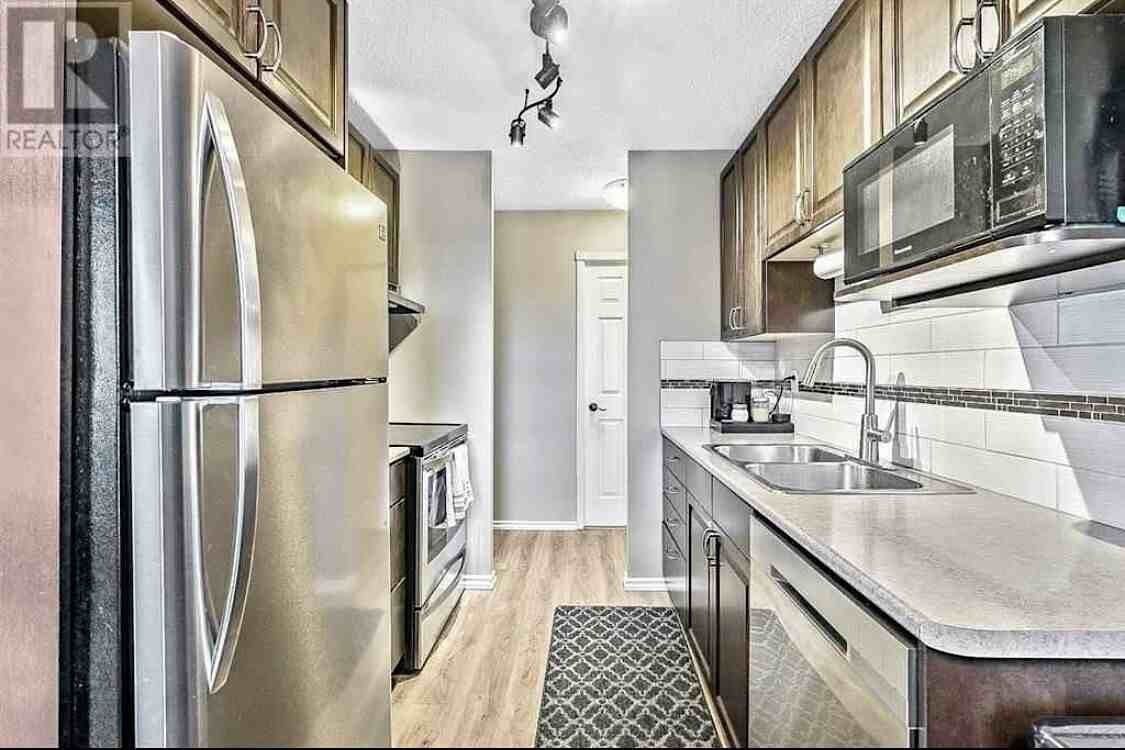 1015 - 1015 14 Avenue Southwest - Photo 6 of 14