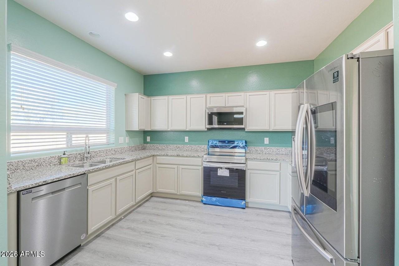 4722 S 238th Ln - Photo 4 of 31