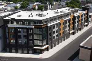 featured image of 587 River St #411