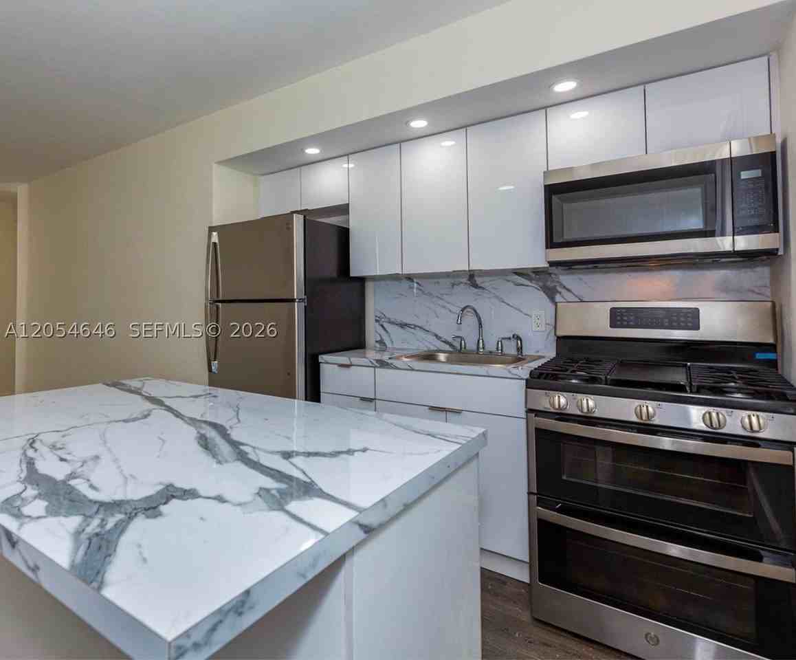 1140 71st St #2 - Photo 6 of 18
