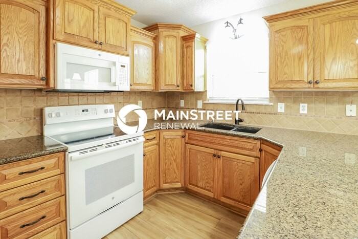 420 Se Alger Dr - Photo 6 of 16