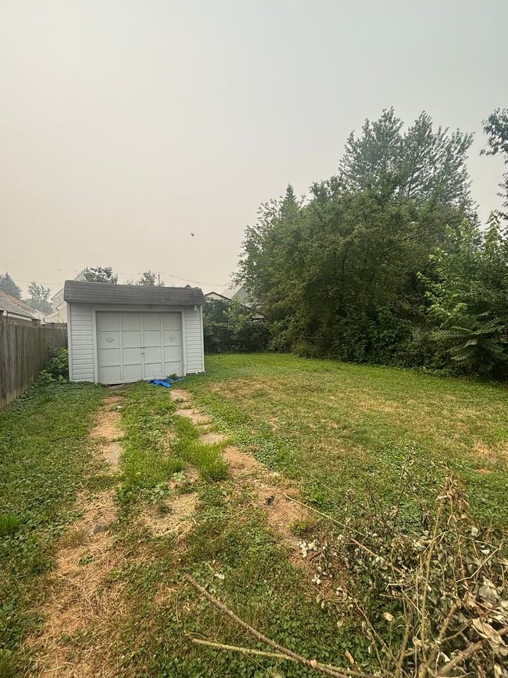 6826 Rathbun Ave - Photo 2 of 9