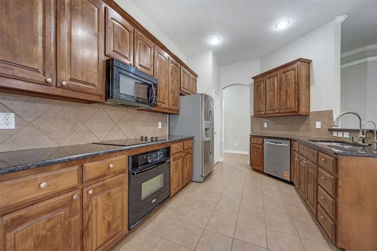 14900 Frisco Ranch Dr - Photo 6 of 27