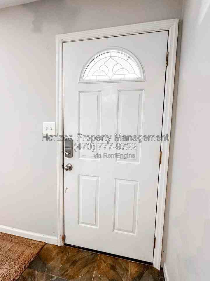 4925 Farmstead Ct Ne - Photo 4 of 21