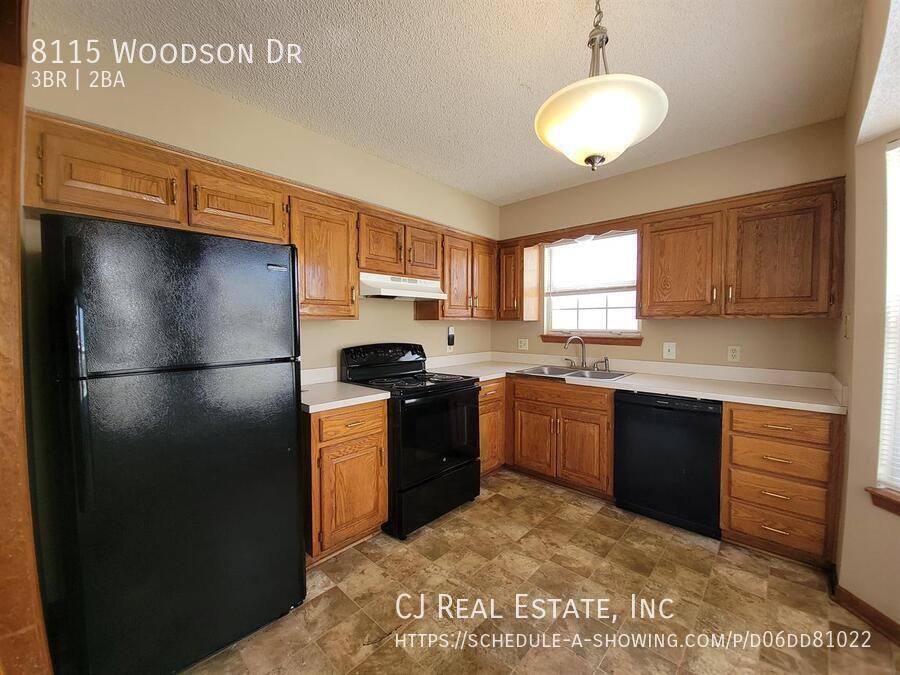 8115 Woodson Dr - Photo 4 of 10