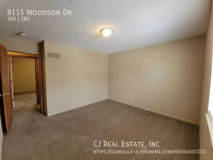 8115 Woodson Dr - Photo 6 of 10
