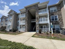 featured image of 618 Condo Club Dr #307