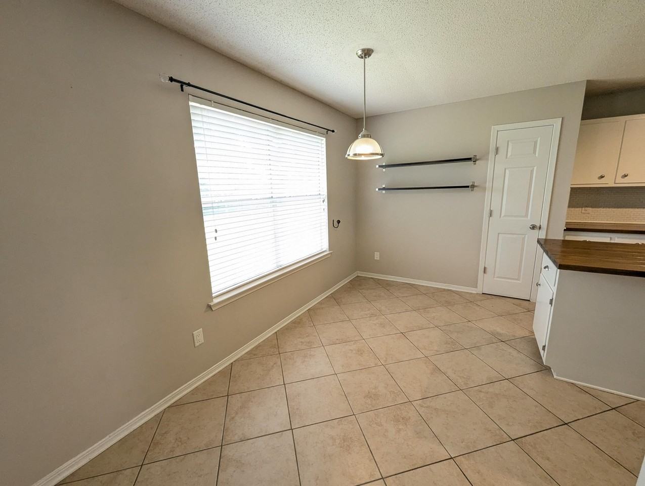 9516 Brentwood Blvd - Photo 6 of 22