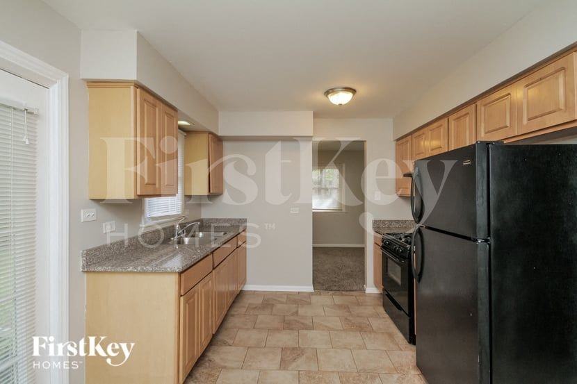 438 E 191st Pl - Photo 6 of 15