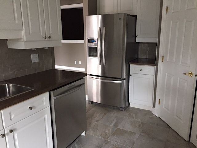 910 - 910 70 Ave Sw - Photo 4 of 16