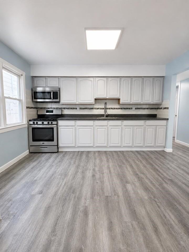 97 Country Village Rd #1 - Photo 4 of 13