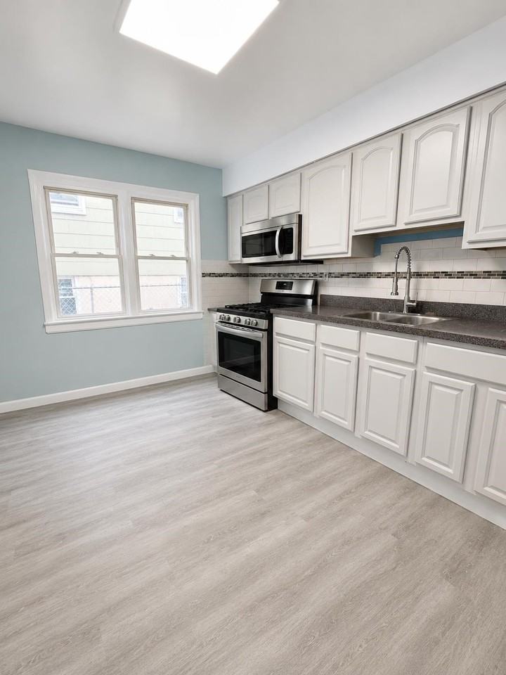 97 Country Village Rd #1 - Photo 5 of 13