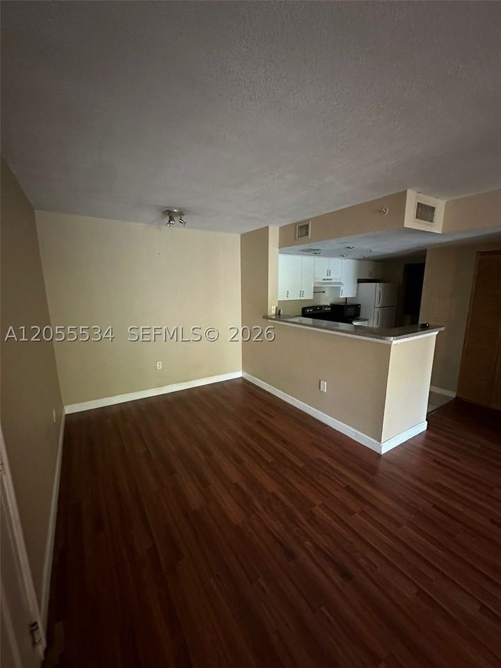 5035 Wiles Rd #203 - Photo 4 of 39