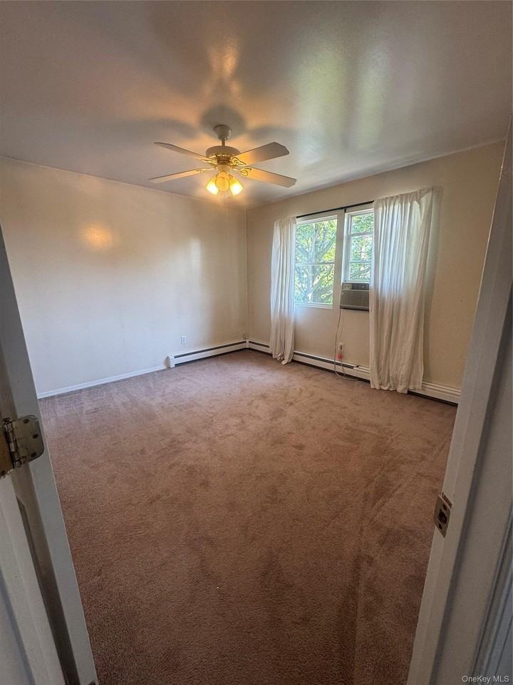 611 Peconic Ave - Photo 7 of 15