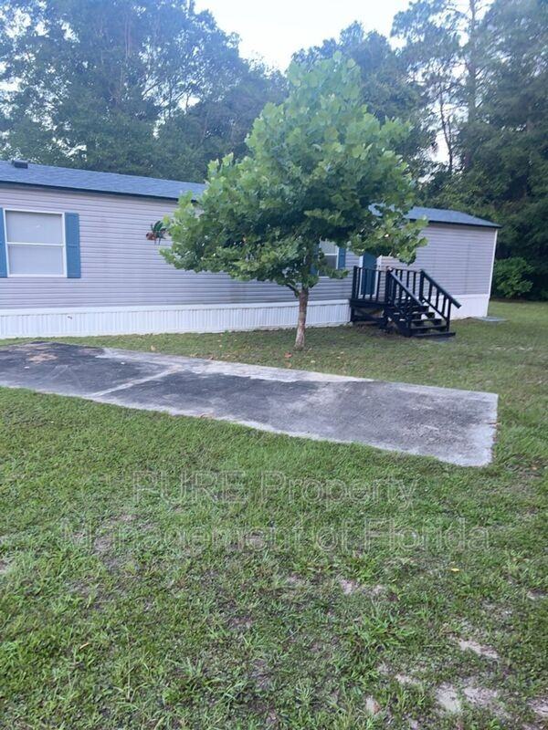 4820 Ne 141st Ter - Photo 3 of 24