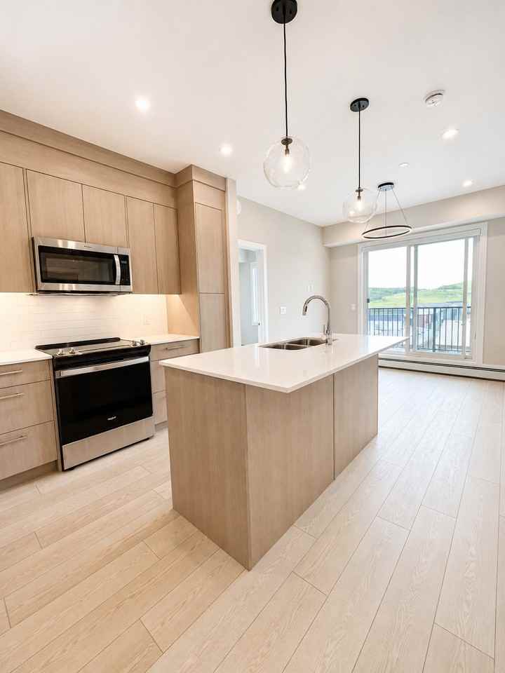 265 Wolf Willow Blvd Se - Photo 6 of 24