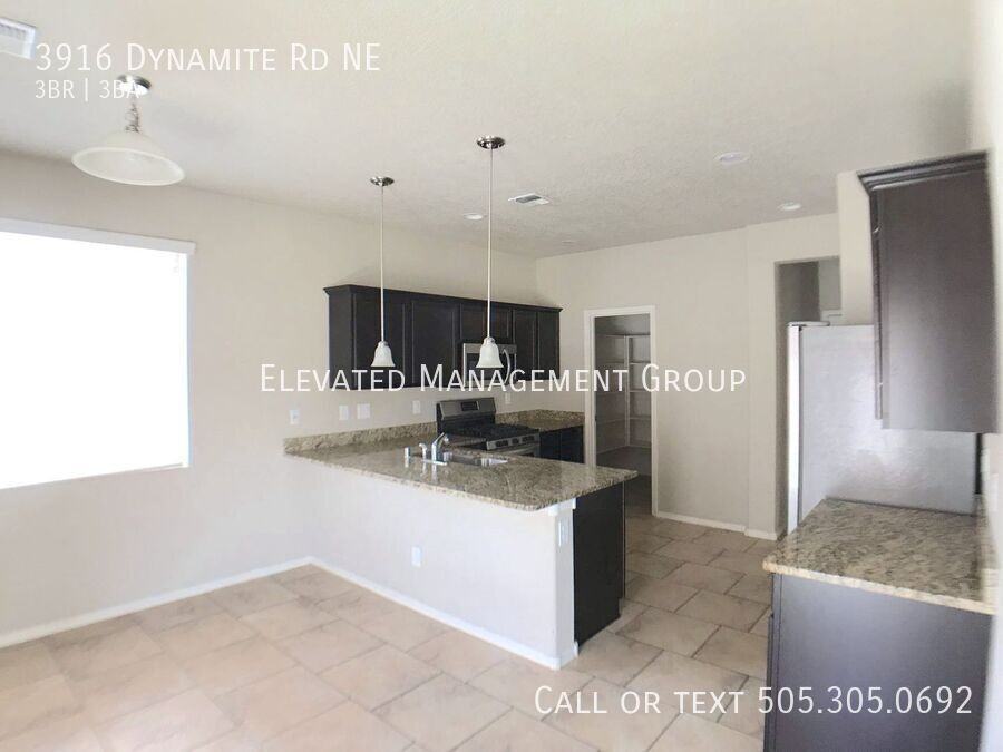 3916 Dynamite Rd Ne - Photo 2 of 16