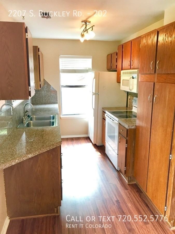 2207 S Buckley Rd #202 - Photo 3 of 9