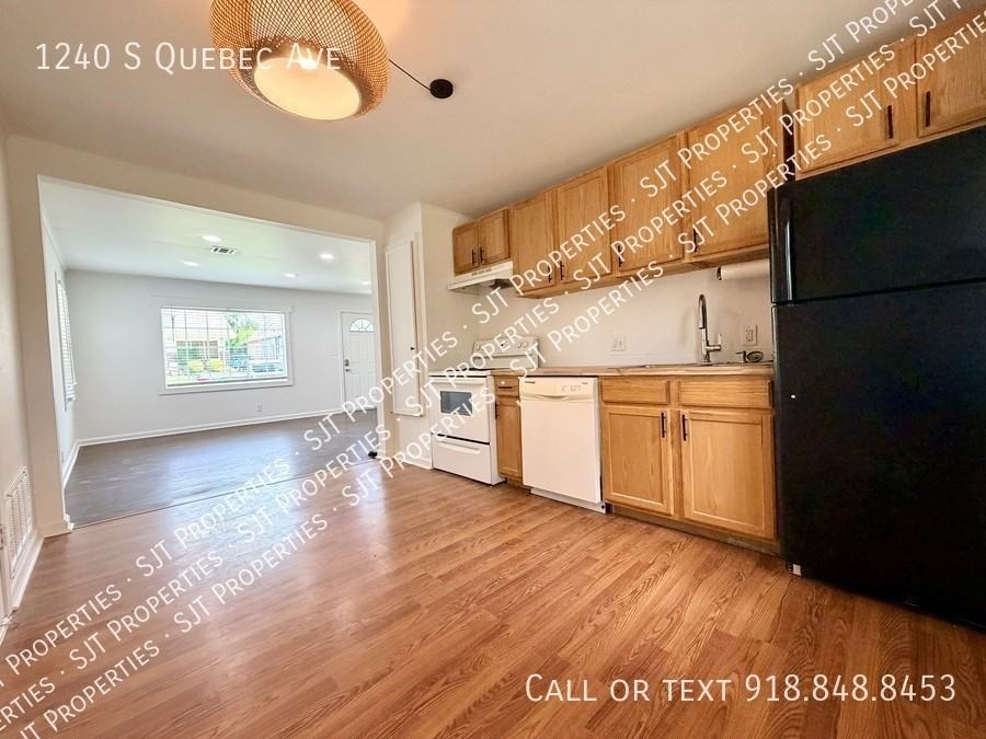 1240 S Quebec Ave - Photo 7 of 13
