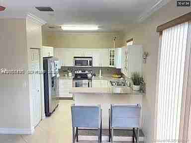 12973 Sw 132nd Ter #0 - Photo 6 of 34