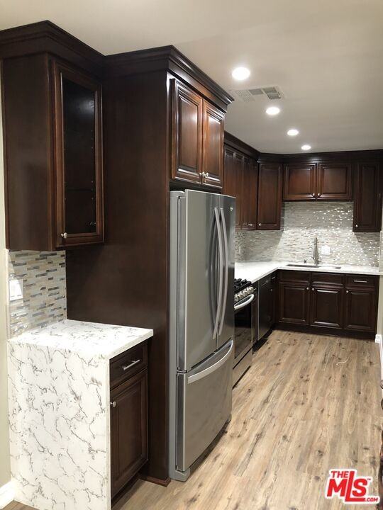 15431 Huston St - Photo 2 of 8