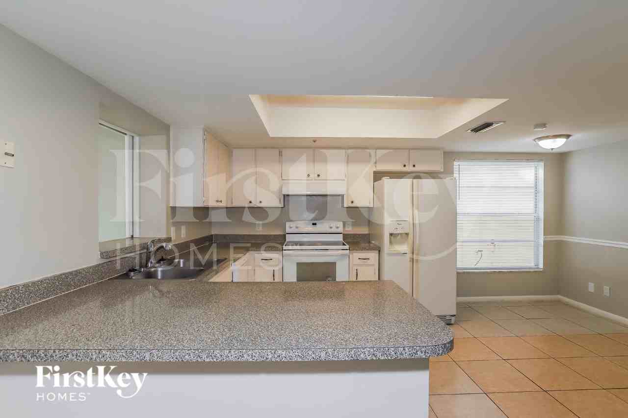 9728 Fox Hollow Rd - Photo 7 of 16