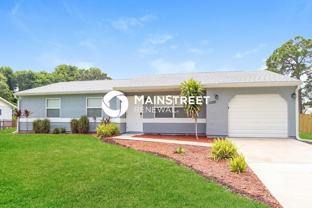 1320 Mann Ave Nw - Photo 1 of 1