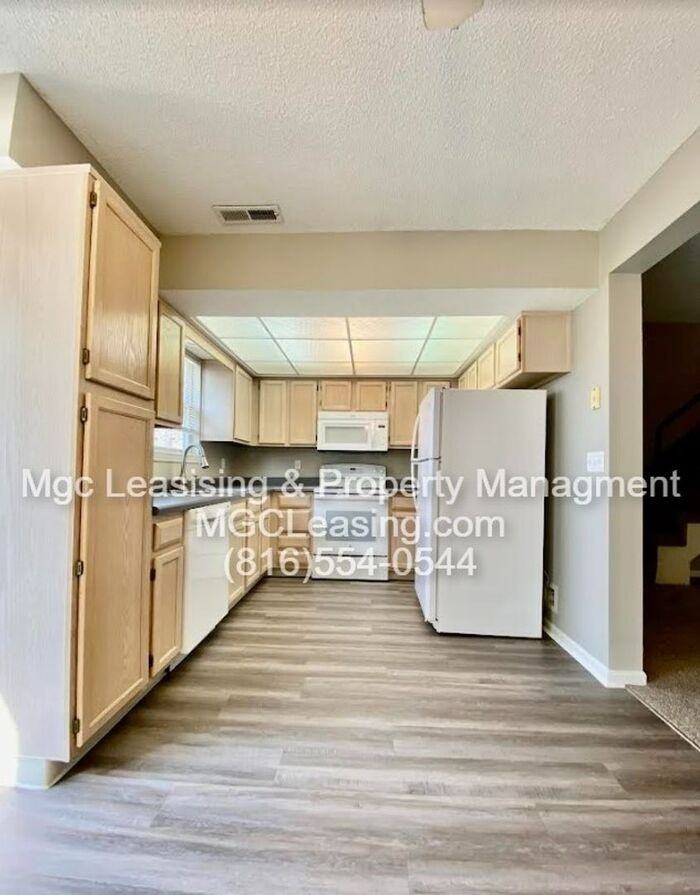 1012B Ne Whispering Winds Ct - Photo 2 of 14