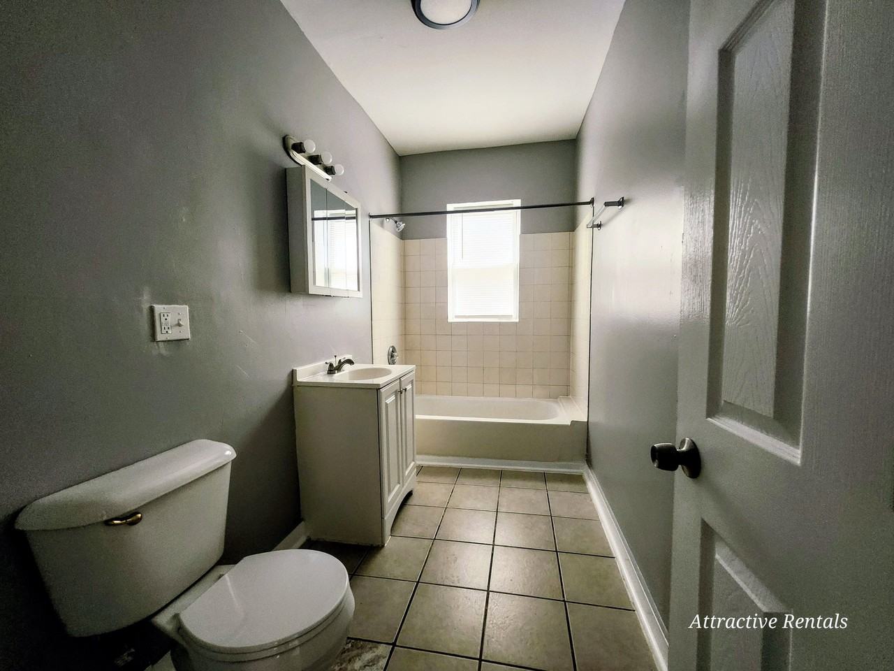 1615 W 78th St #1 - Photo 6 of 13