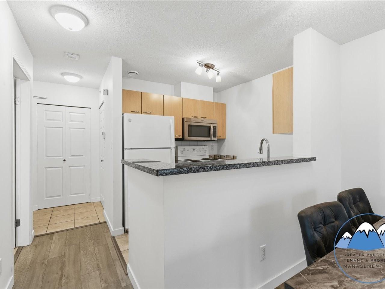 1420 Georgia St W - Photo 6 of 29