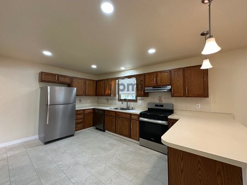 2836 W 63rd Ln - Photo 7 of 23